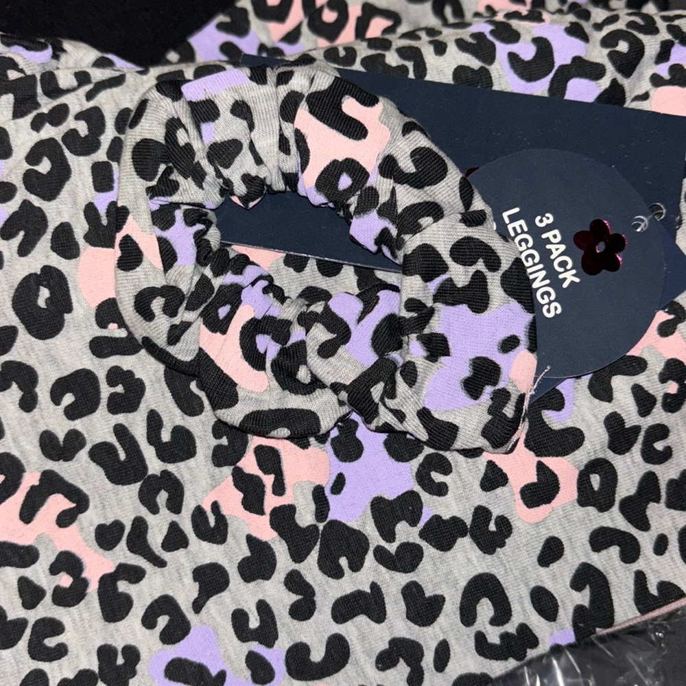Girls tights. Size: 7 Gift included matches tights with cheetah print.